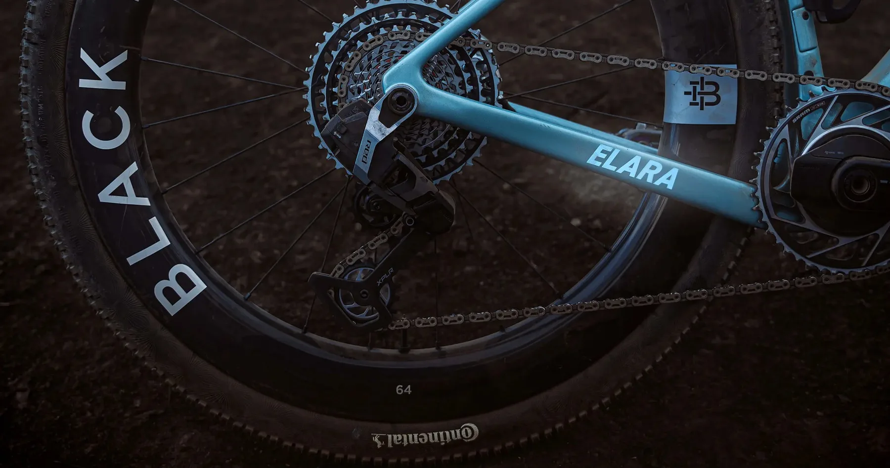 Rear wheel and SRAM Red XPLR drivetrain of a Virescent Blue Factor Elara gravel bike